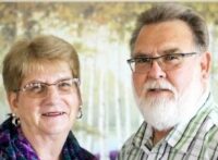 Smiling senior husband and wife